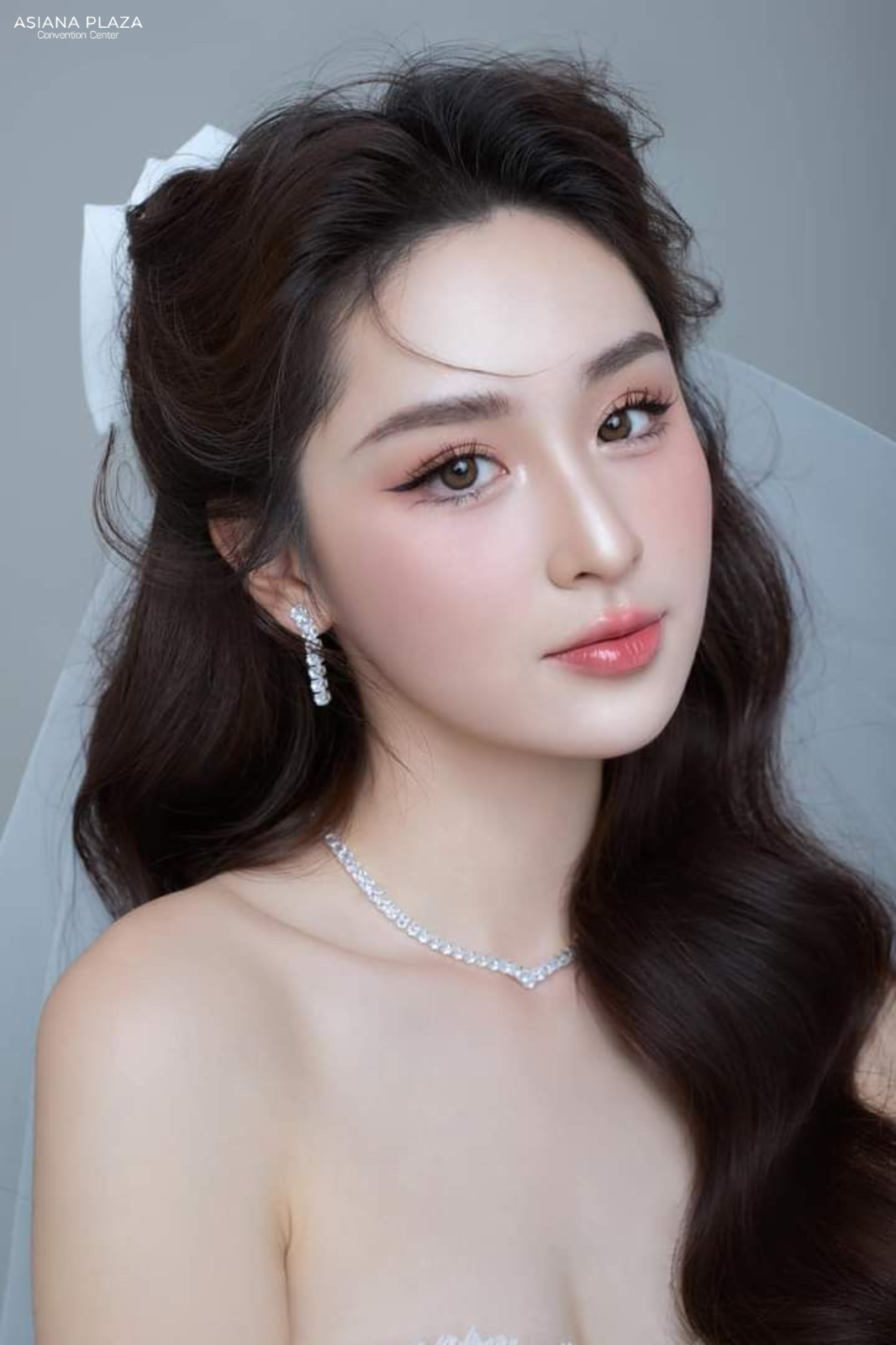 tóc uốn xoăn lơi cho cô dâu